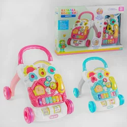 Музичні ходунки-каталка 14818 (8) ""TK Group"", 2 кольори, ОЗВУЧ. УКР. МОВОЮ, знімна панель, підсвічування, звуки, пісні, стопор коліс, в коробці Музичні ходунки-каталка 14818 (8) ""TK Group"", 2 кольори, ОЗВУЧ. УКР. МОВОЮ, знімна панель, підсвічування, звуки, пісні, стопор коліс, в коробці